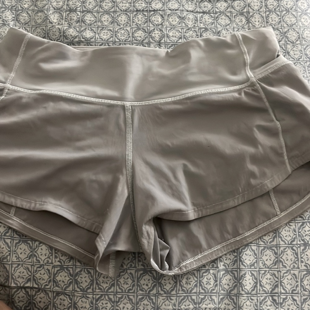 Size to Lululemon white/gray shorts used three times.